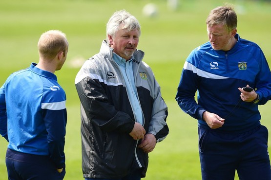 Yeovil Town's new management team in discussion at Thursday's training session. 